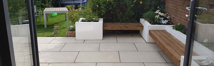 Joseph Mat Landscape,  featheredge fence ,  sandstone paving, beds, brick step