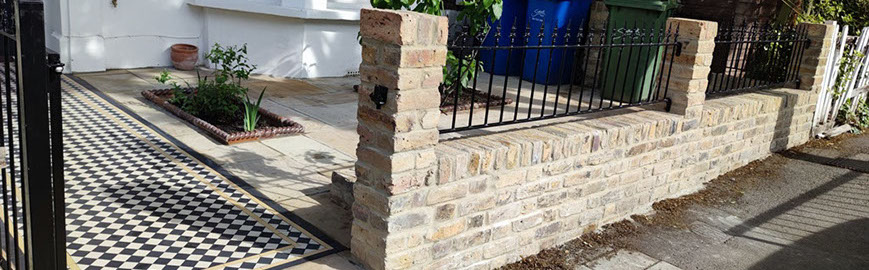 Joseph Mat Landscape,  featheredge fence ,  sandstone paving, beds, brick step